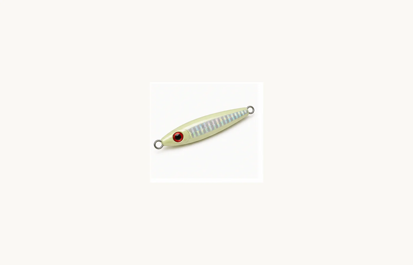 Heavy deep-drop metal jig with a glow finish and attachment rings at each end.