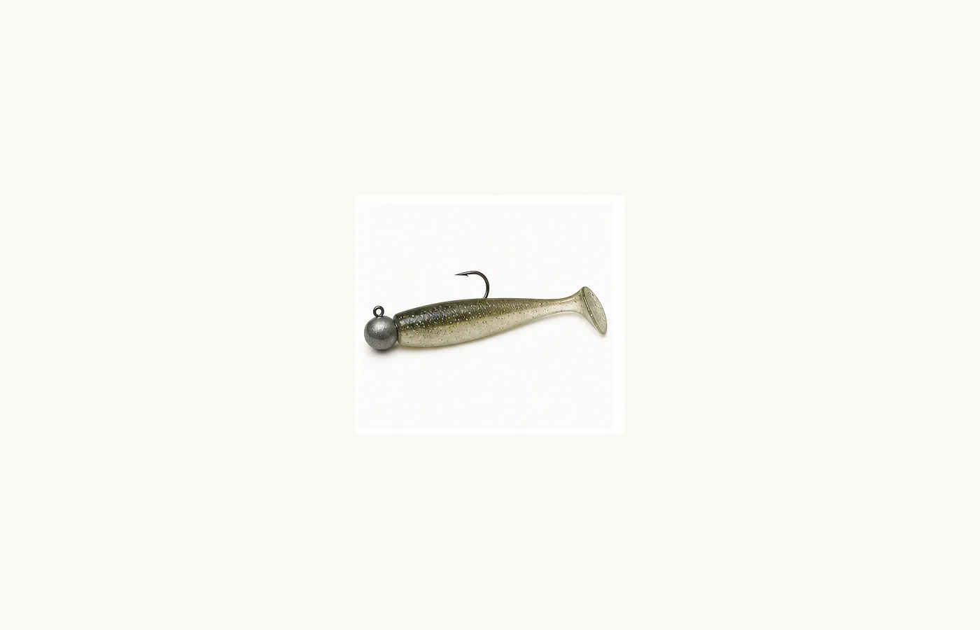 Paddle-tail swimbait rigged on a round jighead with a single exposed hook.