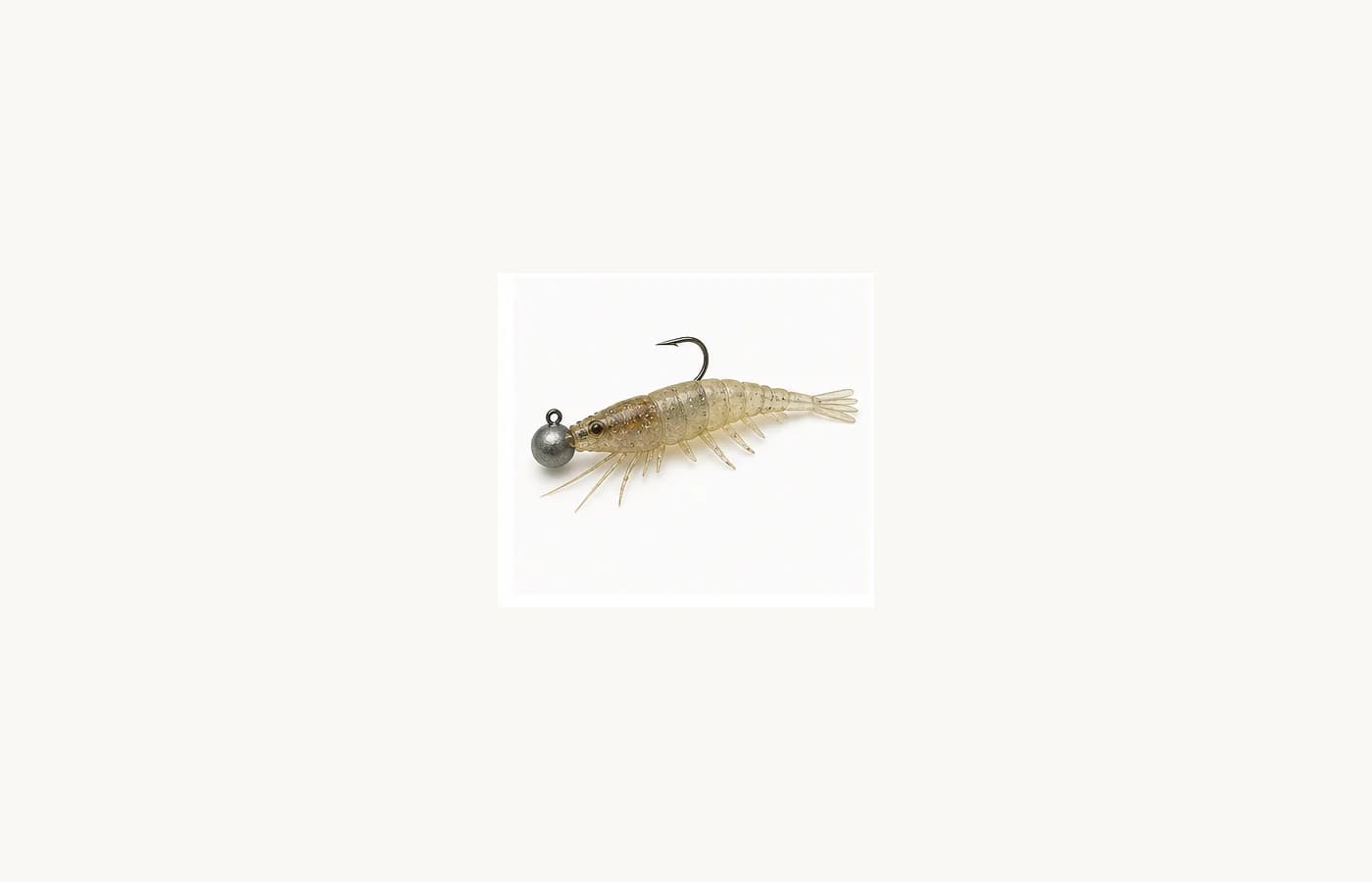 Shrimp-shaped soft plastic lure rigged on a jighead with a single hook.